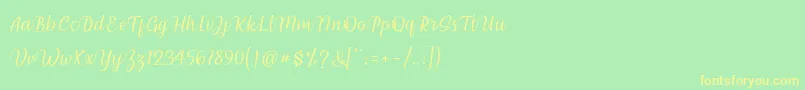 フォントmillenial script – 黄色の文字が緑の背景にあります