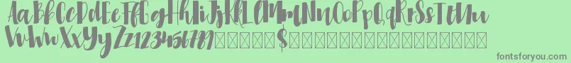 Millicious-Schriftart – Graue Schriften auf grünem Hintergrund