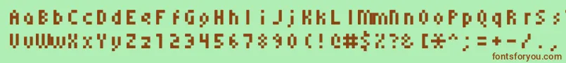 Monoeger0555-fontti – ruskeat fontit vihreällä taustalla