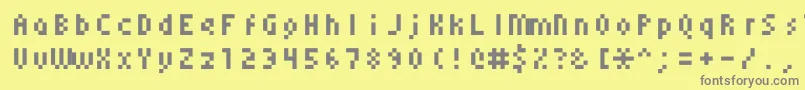 Monoeger0555-Schriftart – Graue Schriften auf gelbem Hintergrund