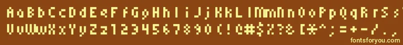 Monoeger0555-fontti – keltaiset fontit ruskealla taustalla
