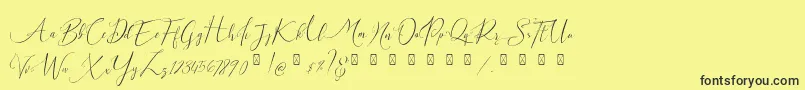 Шрифт Milova Demo – чёрные шрифты на жёлтом фоне