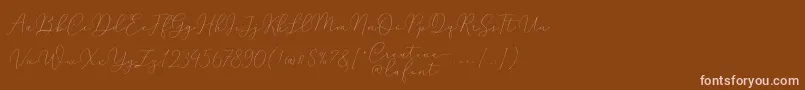 Mindline Script Demo-Schriftart – Rosa Schriften auf braunem Hintergrund