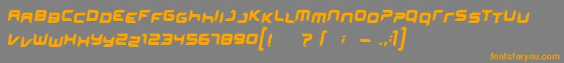 フォントMINISKIP – オレンジの文字は灰色の背景にあります。