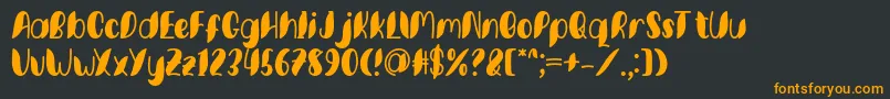 フォントMinkem font by 7NTypes D – 黒い背景にオレンジの文字