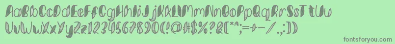Minkem Stripe Font by 7NTypes-Schriftart – Graue Schriften auf grünem Hintergrund