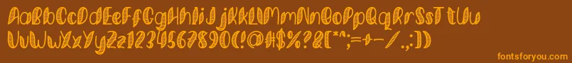 Minkem Stripe Font by 7NTypes Font – Orange Fonts on Brown Background