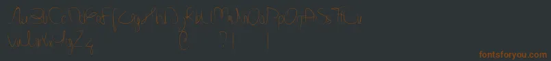 Minnesottafree Font – Brown Fonts on Black Background