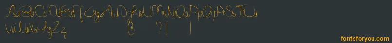 フォントMinnesottafree – 黒い背景にオレンジの文字