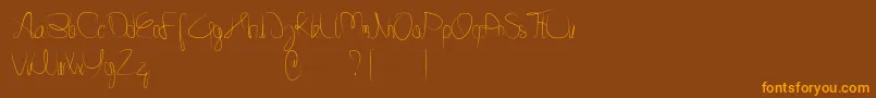 Minnesottafree Font – Orange Fonts on Brown Background