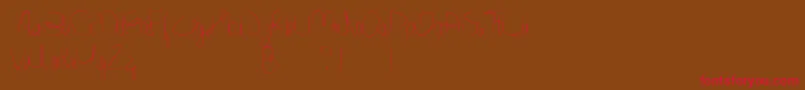 Minnesottafree Font – Red Fonts on Brown Background