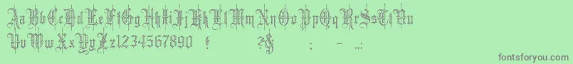 Шрифт minster6 – серые шрифты на зелёном фоне