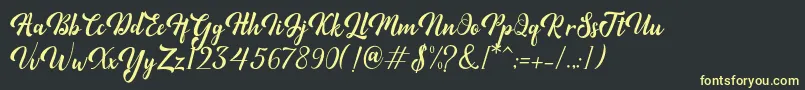 Minthas Font – Yellow Fonts on Black Background