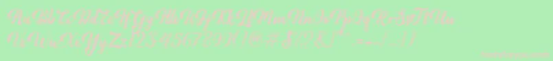 Minthas Font – Pink Fonts on Green Background