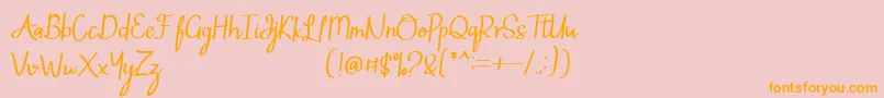 フォントMintlic – オレンジの文字がピンクの背景にあります。
