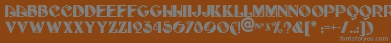 Full-fontti – harmaat kirjasimet ruskealla taustalla