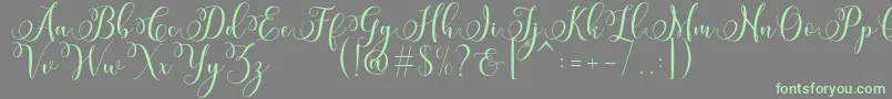 Miracle Script Free-Schriftart – Grüne Schriften auf grauem Hintergrund