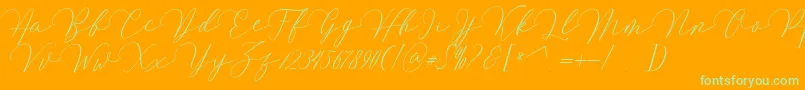 Mirrabella-Schriftart – Grüne Schriften auf orangefarbenem Hintergrund