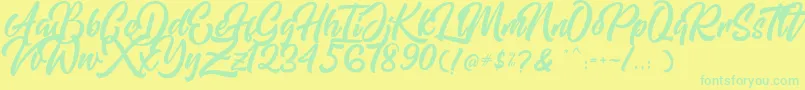 Mishaland Font – Green Fonts on Yellow Background