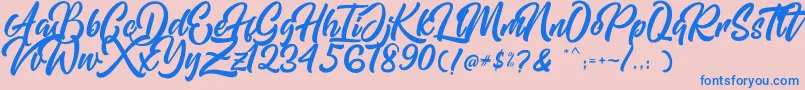 Mishaland Font – Blue Fonts on Pink Background