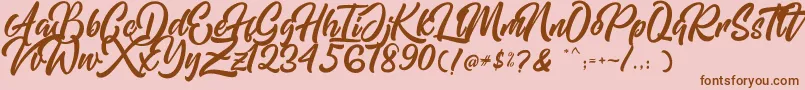 Mishaland Font – Brown Fonts on Pink Background