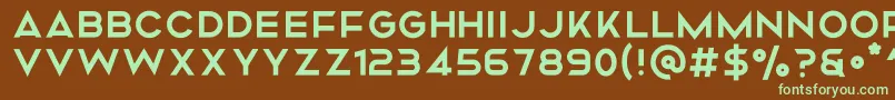 Mismo Regular-fontti – vihreät fontit ruskealla taustalla