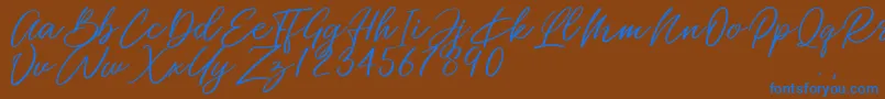 Miss Catlyne Font – Blue Fonts on Brown Background
