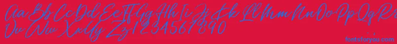 Miss Catlyne Font – Blue Fonts on Red Background