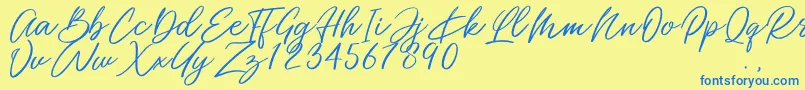 Miss Catlyne Font – Blue Fonts on Yellow Background