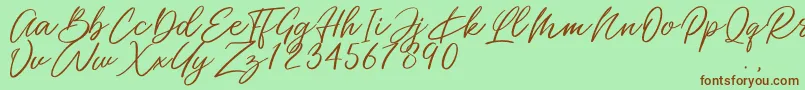 Miss Catlyne Font – Brown Fonts on Green Background