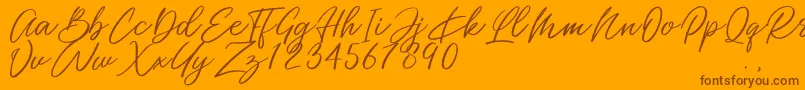 Miss Catlyne Font – Brown Fonts on Orange Background