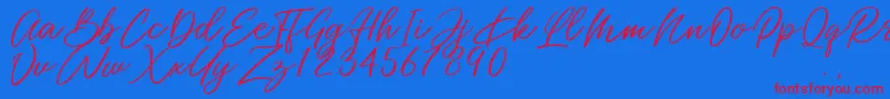 Miss Catlyne Font – Red Fonts on Blue Background
