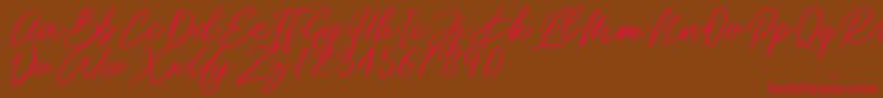 Miss Catlyne Font – Red Fonts on Brown Background