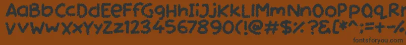 Miss Chalkboard Font – Black Fonts on Brown Background