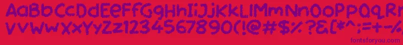 Czcionka Miss Chalkboard – fioletowe czcionki na czerwonym tle