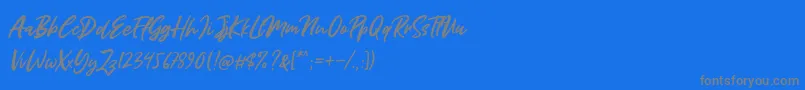 Miss Rhinetta-Schriftart – Graue Schriften auf blauem Hintergrund