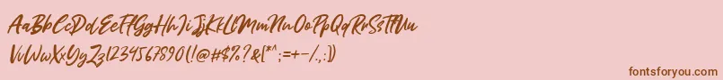 Miss Rhinetta-Schriftart – Braune Schriften auf rosa Hintergrund