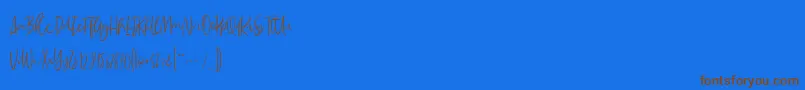 Police MadeleineDemo – polices brunes sur fond bleu