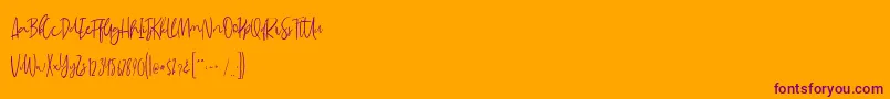 Czcionka MadeleineDemo – fioletowe czcionki na pomarańczowym tle