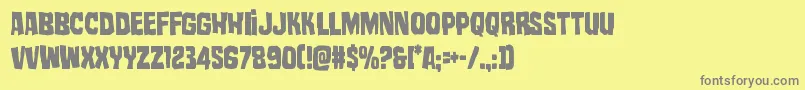 フォントmistertwistedcond – 黄色の背景に灰色の文字