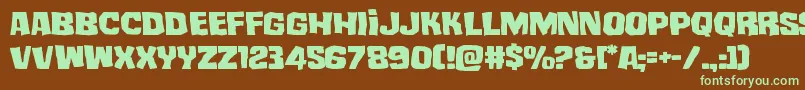 フォントmistertwistedexpand – 緑色の文字が茶色の背景にあります。