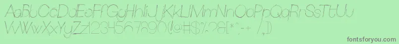Sketchica-Schriftart – Graue Schriften auf grünem Hintergrund