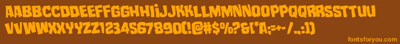 mistertwistedrotate-Schriftart – Orangefarbene Schriften auf braunem Hintergrund