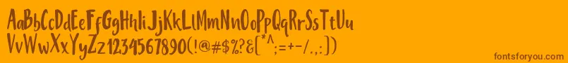 MisteryFont-Schriftart – Braune Schriften auf orangefarbenem Hintergrund