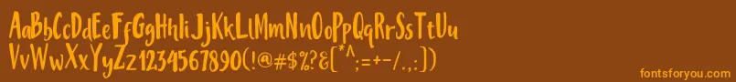 MisteryFont Font – Orange Fonts on Brown Background