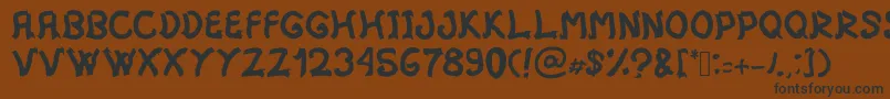 フォントMistica – 黒い文字が茶色の背景にあります