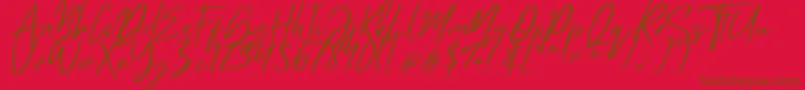 フォントMistrully – 赤い背景に茶色の文字