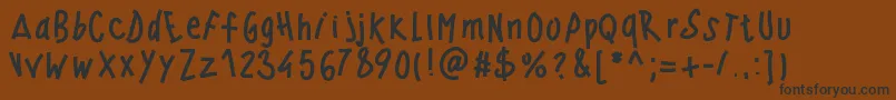 Pwwindyfont-Schriftart – Schwarze Schriften auf braunem Hintergrund