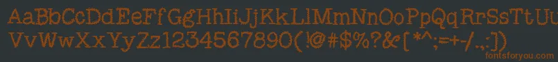 Czcionka MixSquiggle – brązowe czcionki na czarnym tle