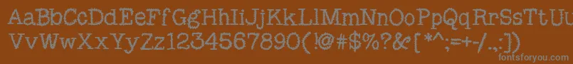 MixSquiggle Font – Gray Fonts on Brown Background